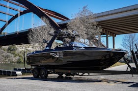 Rent a Centurion RI245 Surf Boat on Lake Austin