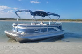 Bennington Tritoon 21L in New Smyrna Beach