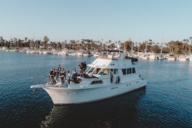 60' Luxury Hatteras Yacht for Private Charters & Party Cruises